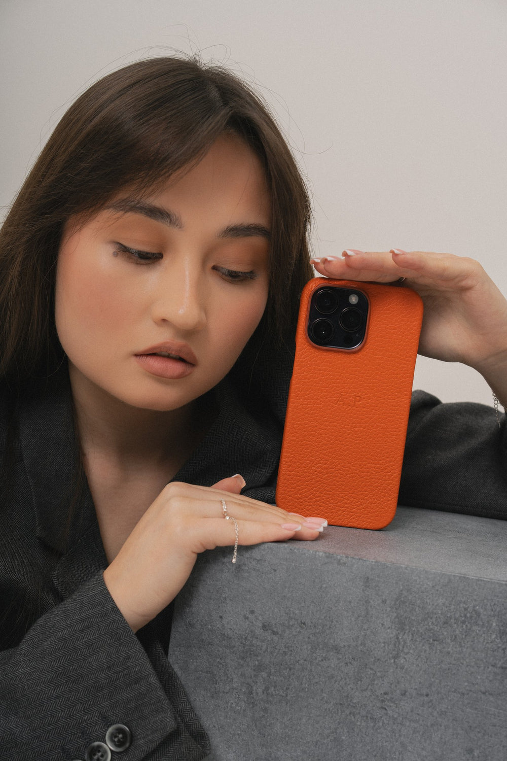 Orange leather case for iPhone 15 Plus