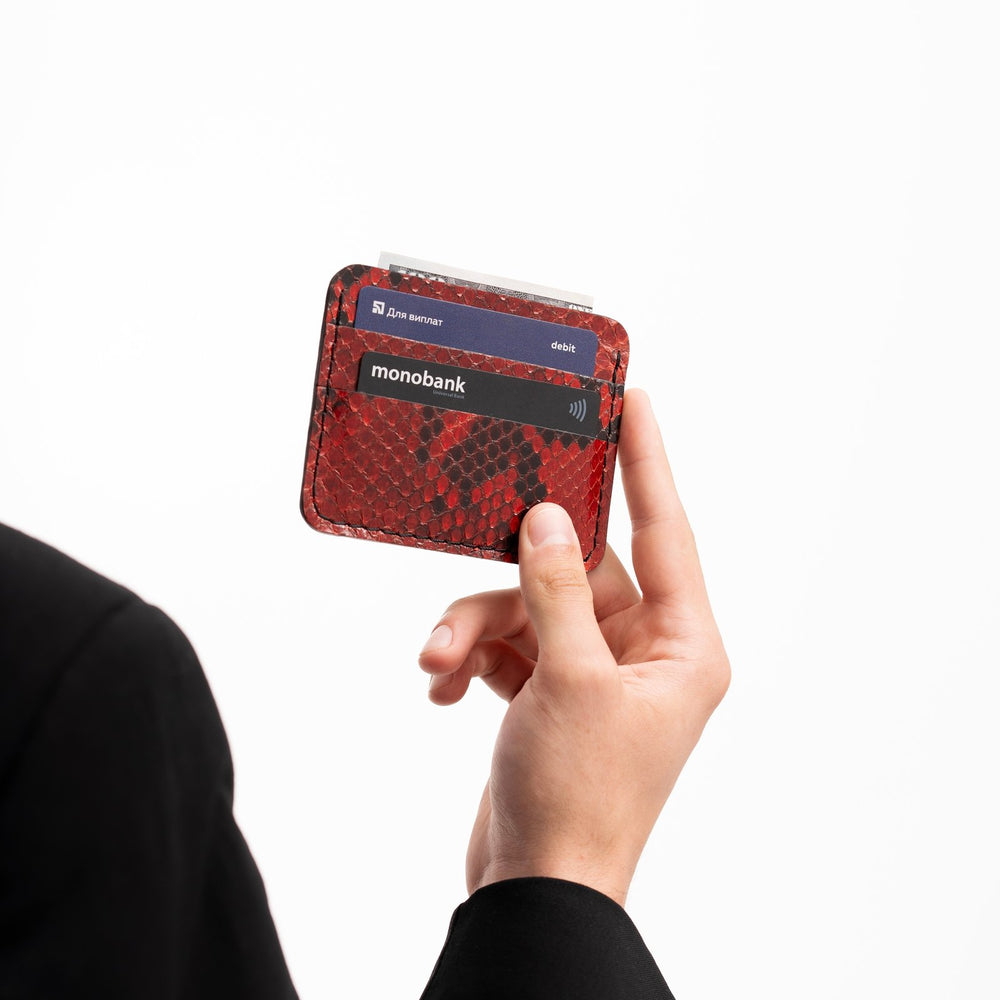 Cardholder made of red python leather with small scales