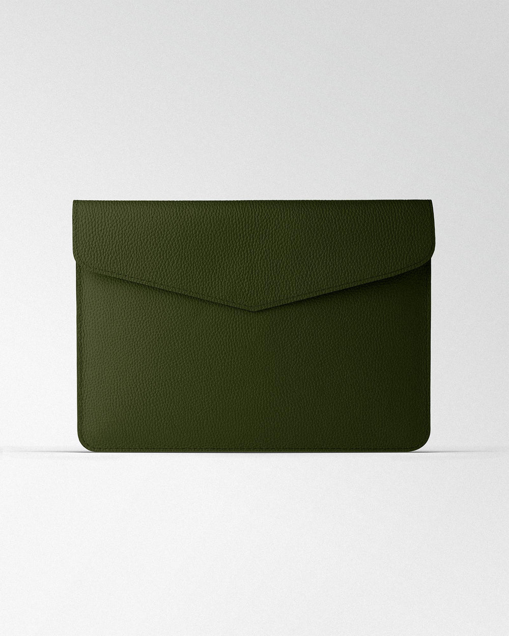 Magnetic case made of dark green textured leather for MacBook