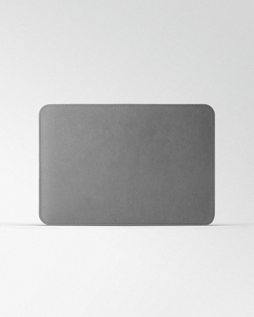Minimalist case made of light gray alcantara for MacBook