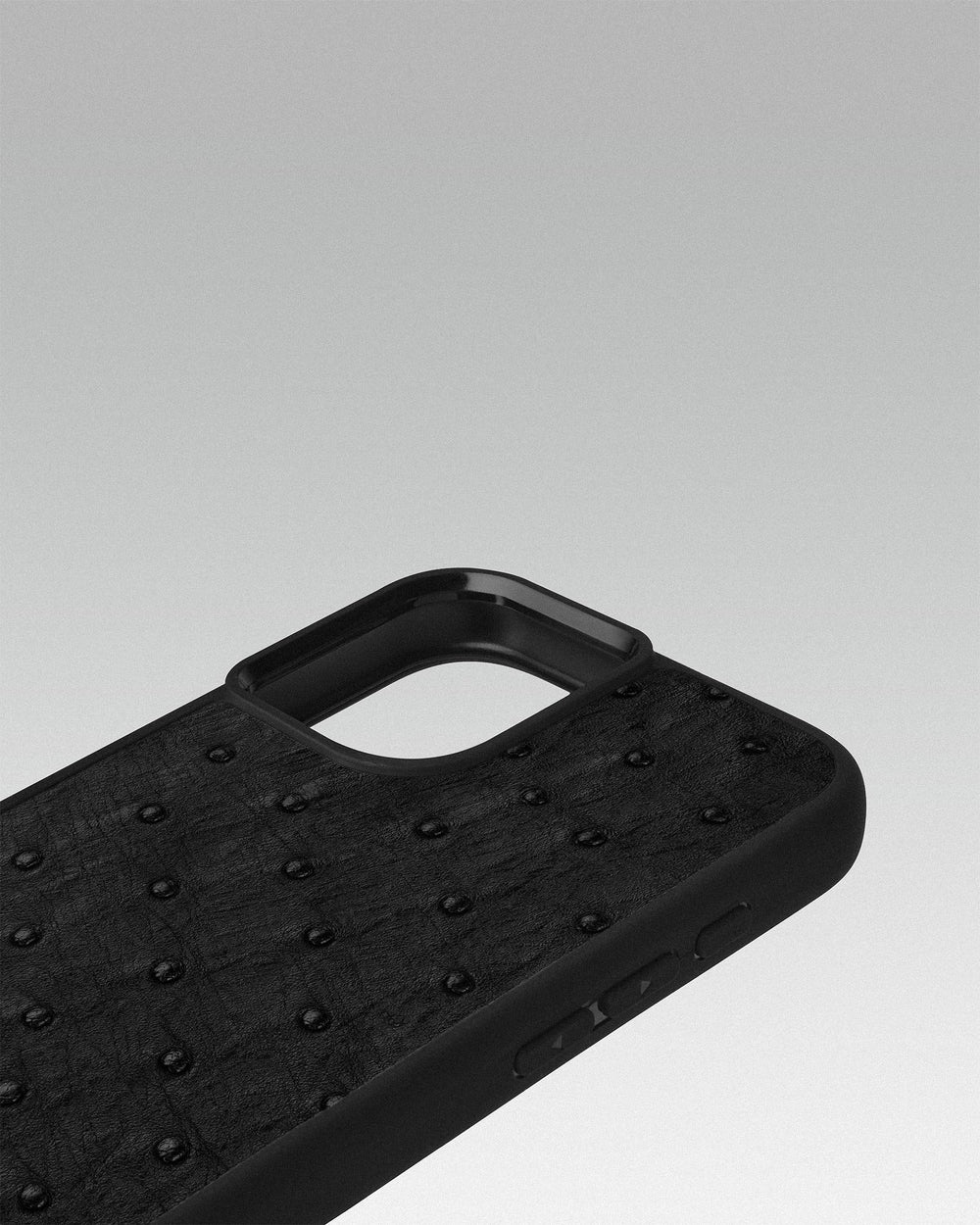 Black ostrich leather case with follicles for iPhone 16 Plus