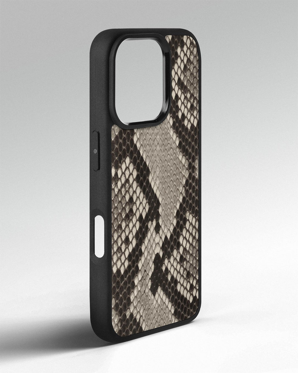 Case made of black and white python leather with small scales for iPhone 16 Pro Max