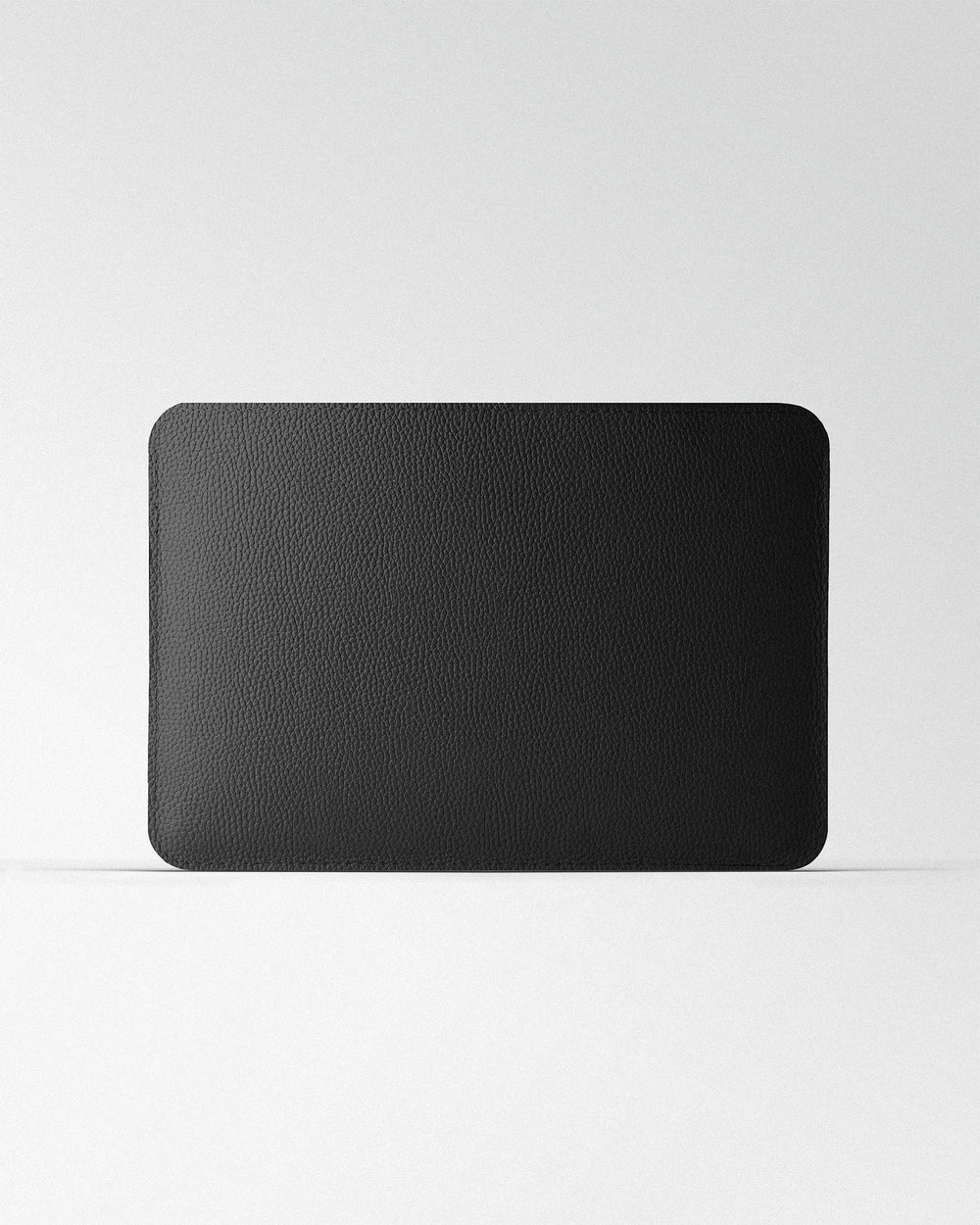 Minimalist black leather case for MacBook