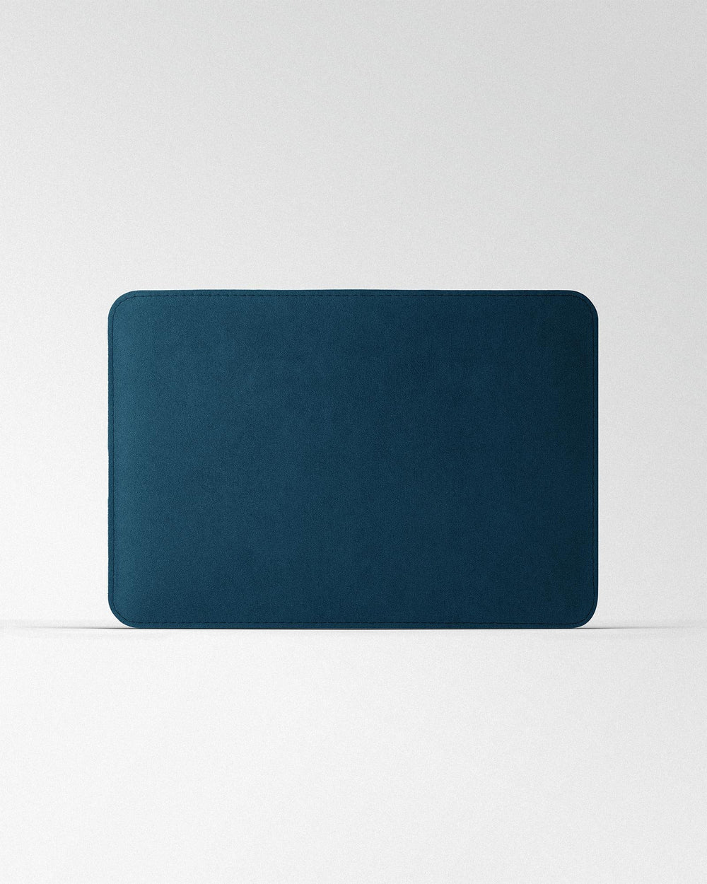 Minimalist case made of blue alcantara for MacBook