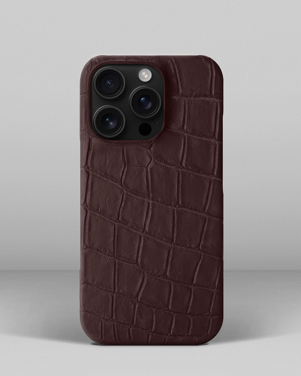 Dark brown crocodile leather-wrapped case for iPhone 16 Pro