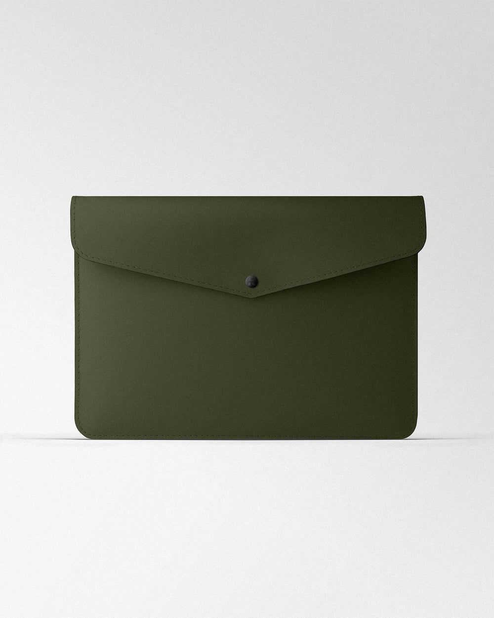 Envelope case in dark green leather for MacBook