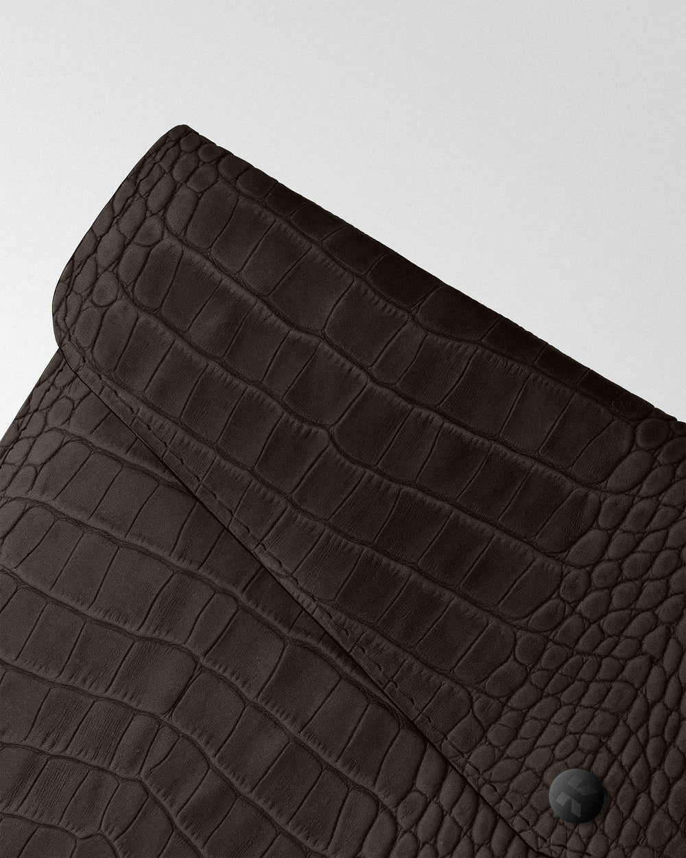 Envelope case in dark brown crocodile embossing for MacBook