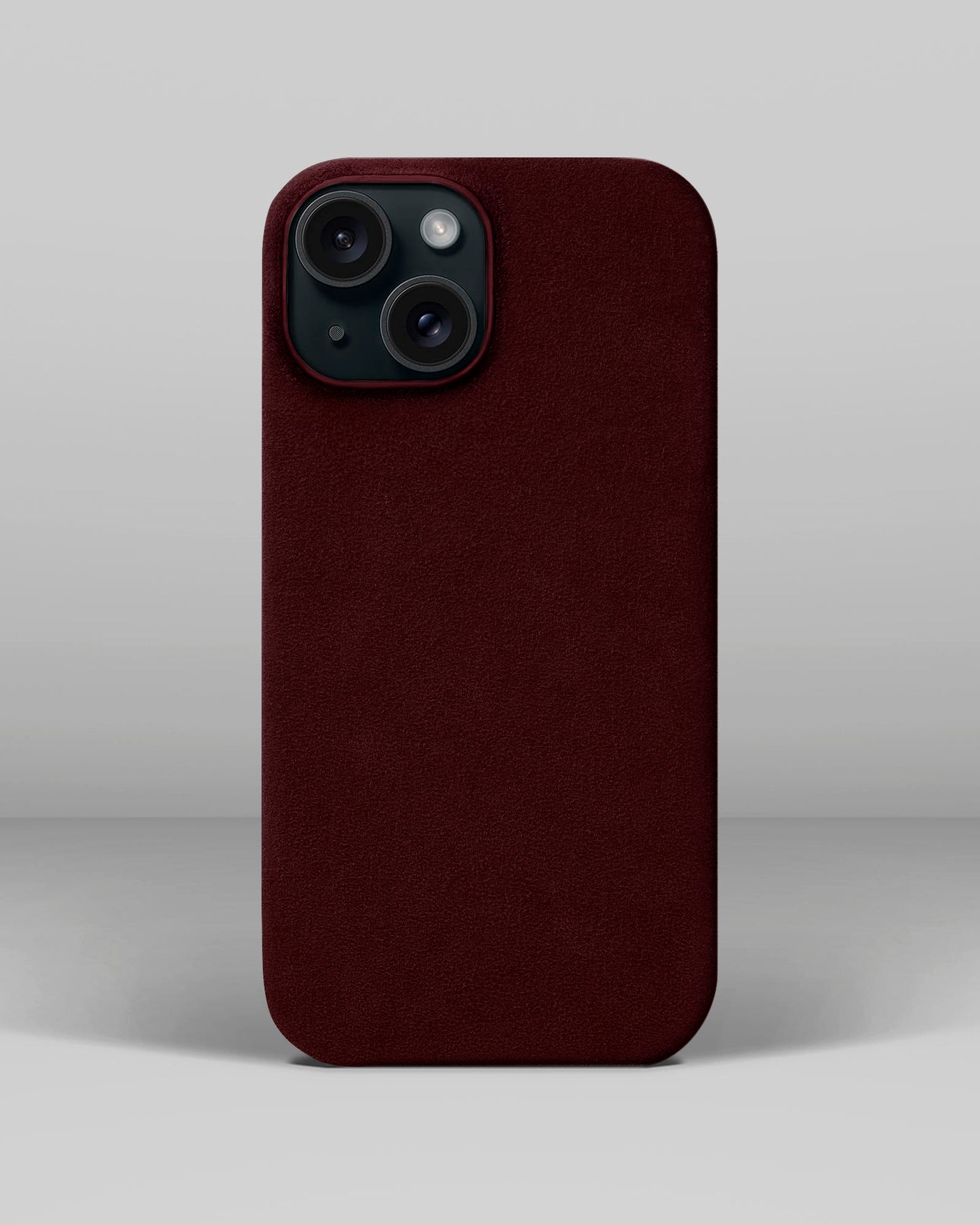 Бордовий чохол з алькантари для iPhone 15