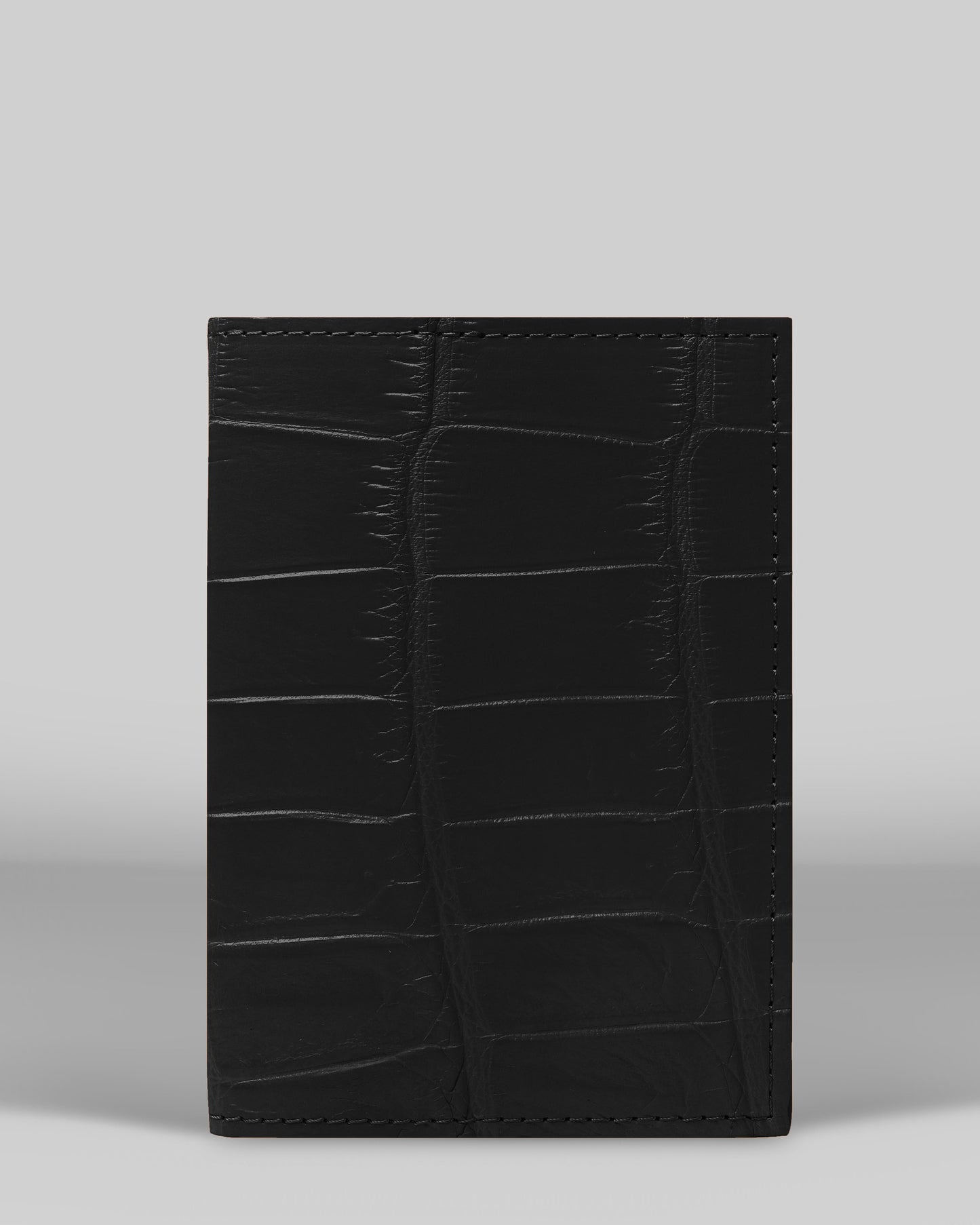 Passport cover made of black crocodile leather