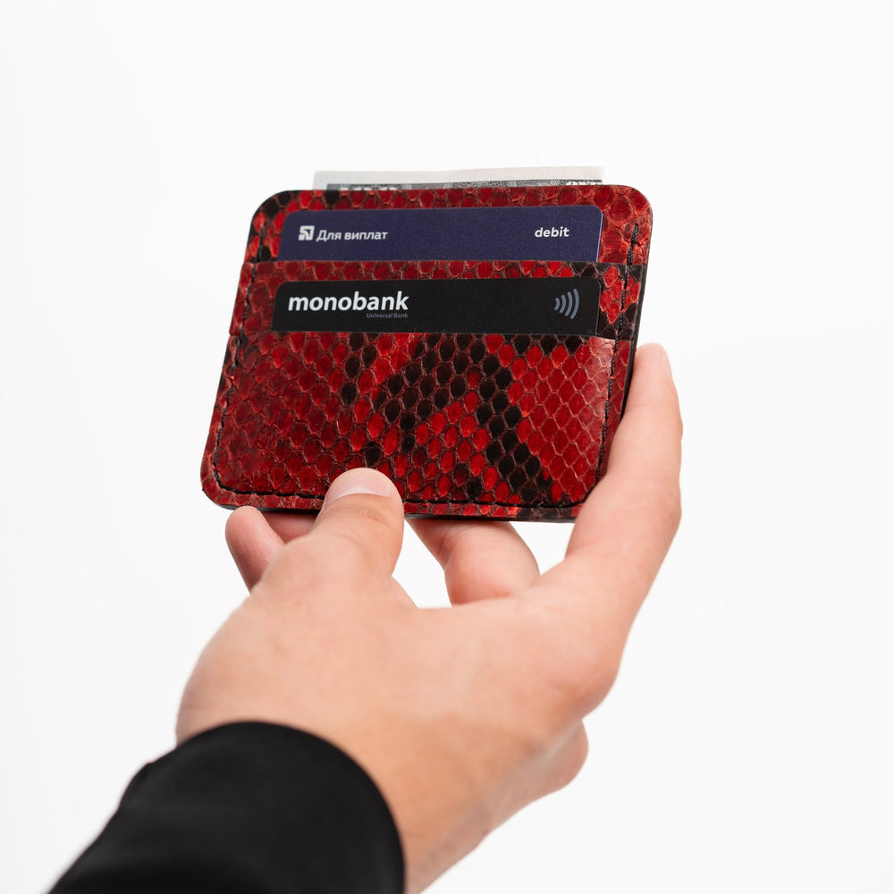 Cardholder made of red python leather with small scales