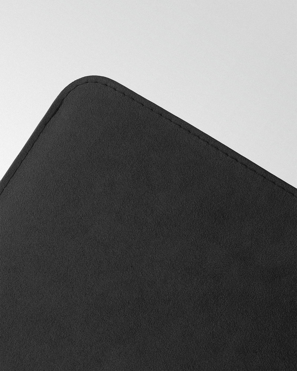 Minimalist case made of black alcantara for MacBook